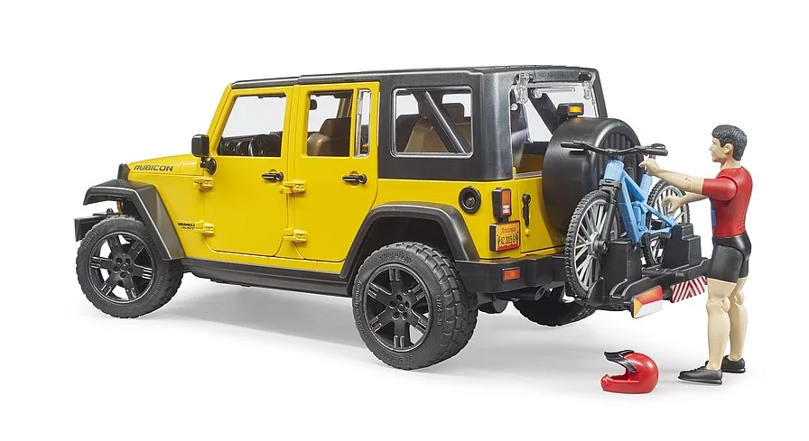 Heckansicht: Jeep Wrangler mit montiertem Fahrradträger und aufgeladenem Mountainbike