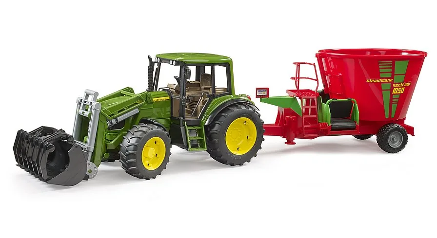 Bruder Futtermischwagen im Einsatz angehängt an einen John Deere Traktor