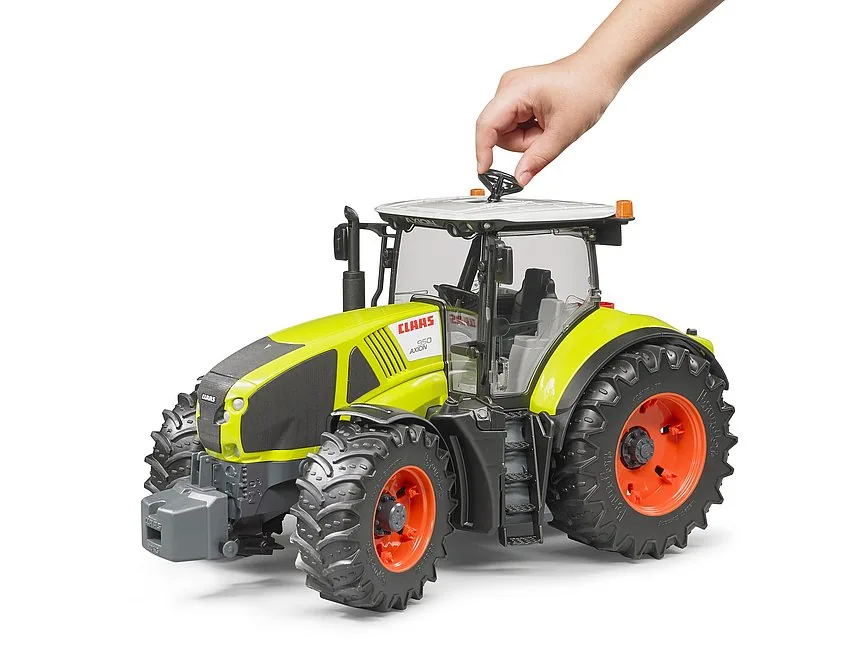 Kinderleichte Steuerung: Lenken des Claas Traktors durch das Schiebedach mit Lenkverlängerung
