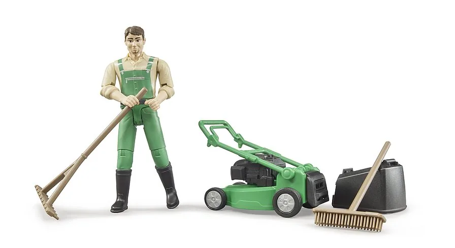 Landschaftsgärtner mit Zubehör: Rechen und Besen für die Gartenarbeit