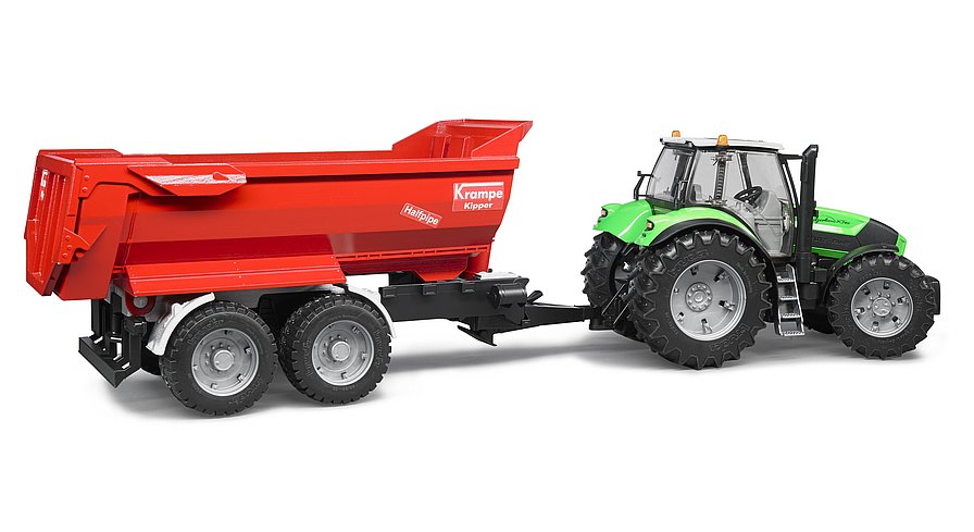 Bruder Krampe Muldenkipper im Gespann angehängt an einen grünen Traktor