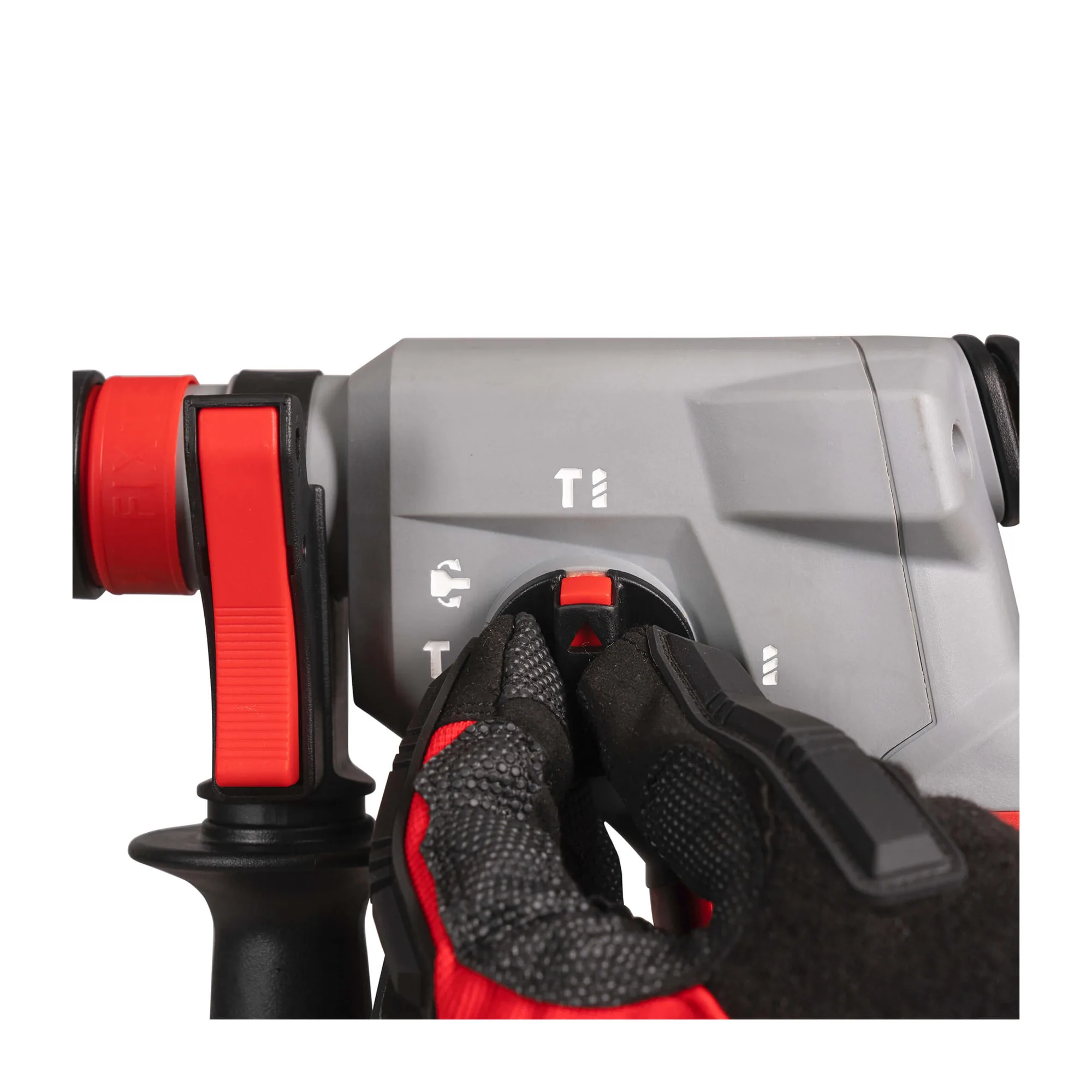 Behandschuhte Hand am Wahlschalter des Milwaukee M18 BLHX Kombihammers