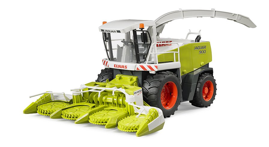 Claas Jaguar 900 mit heruntergeklapptem 4-Scheiben-Maisgebiss bereit für die Ernte