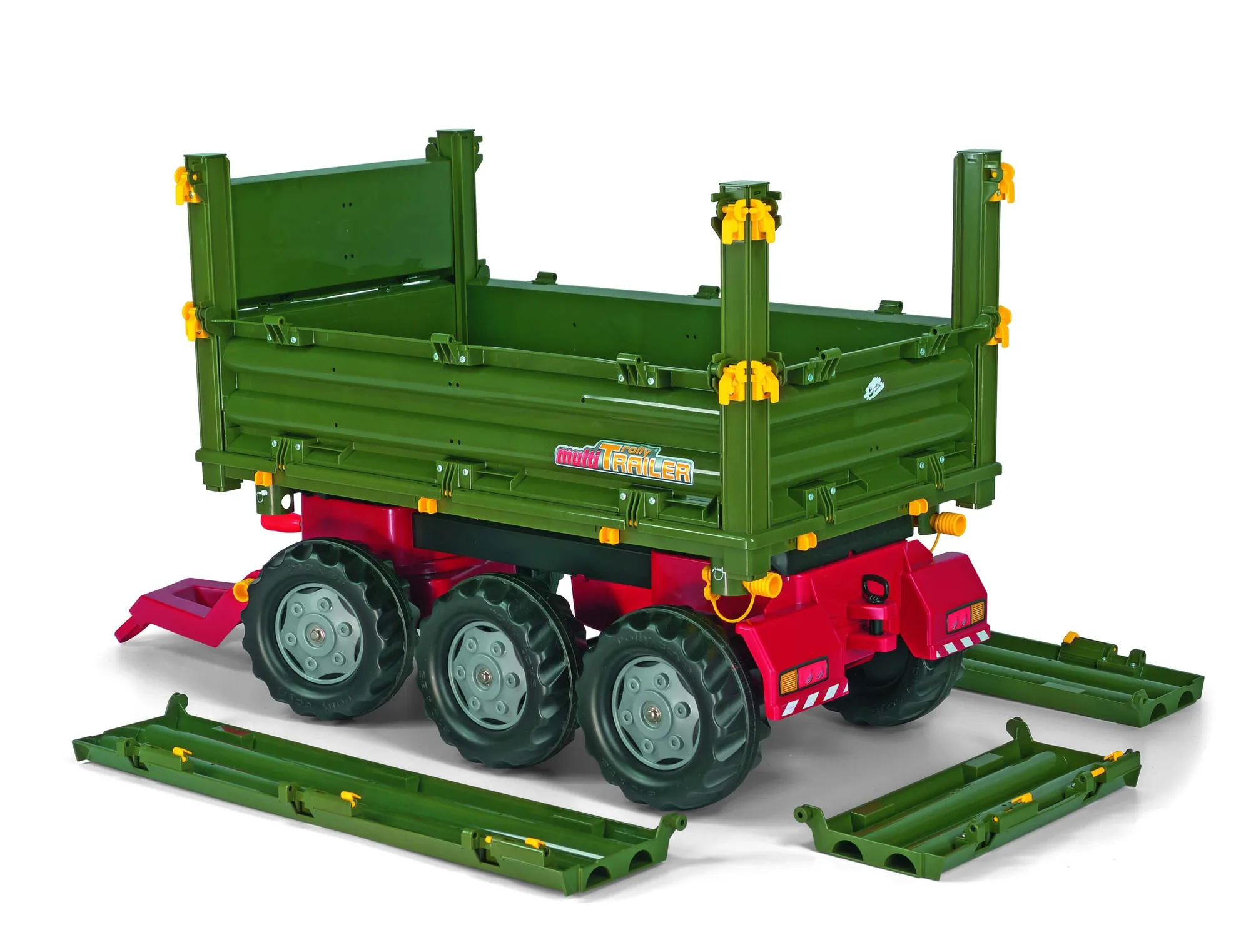 Grüner rollyMulti Trailer Dreiseitenkipper mit gekippter Mulde, freigestellt