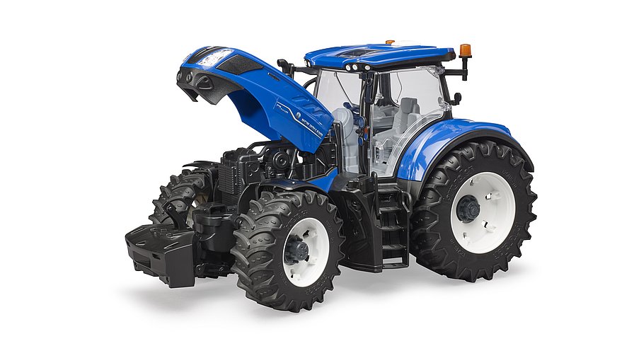 Blick unter die Haube: Geöffnete Motorhaube zeigt den Motor des New Holland T7